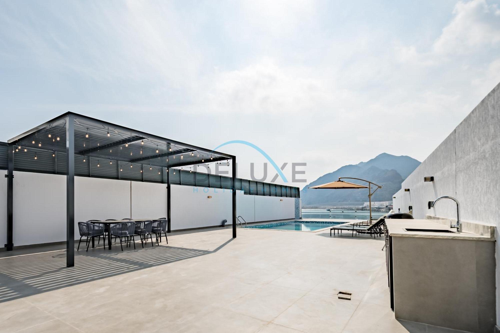 Апартаменти Getaway Offer With Pool, Bbq & Picturesque Views By Deluxe Homes Ель-Фуджайра